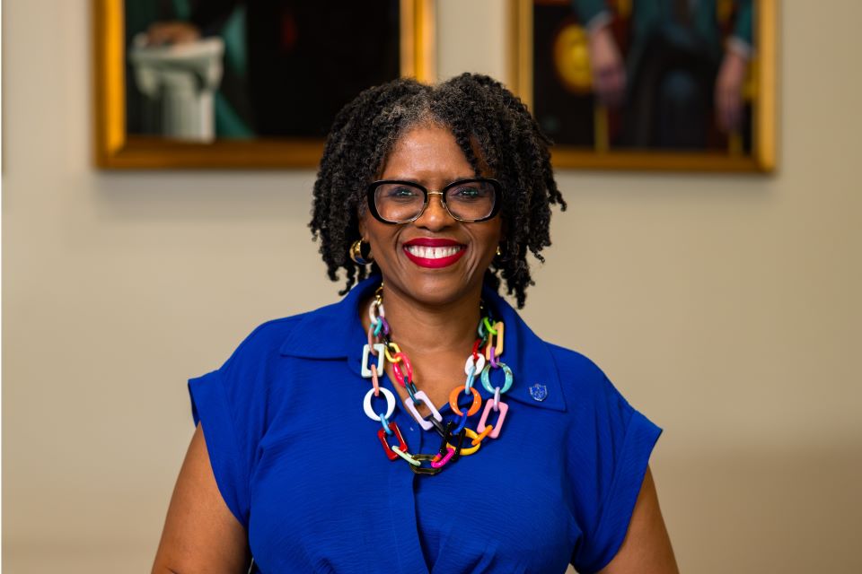 Dean Johnson poses in the courtroom at Scott Hall Dean Johnson poses in the courtroom at Scott Hall