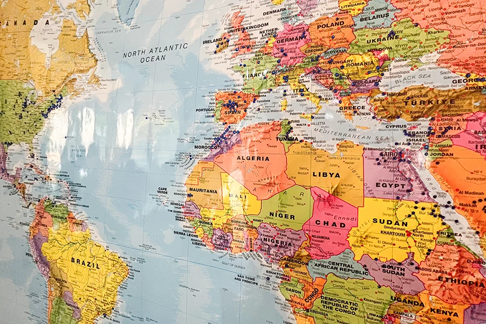 Record Enrollment Expands SLU-Madrid's Global Community Map found in San Ignacio Hall lobby where students have marked their cities of origin.