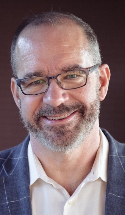 A headshot of Rick Grucza.