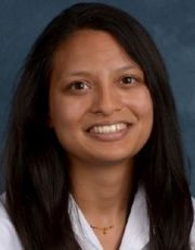 Headshot of Armrita Aranake-Chrisinger