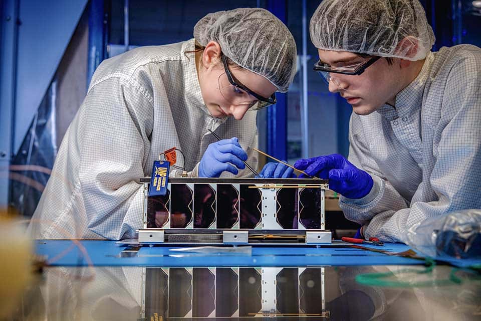 SLU aerospace engineering undergraduates prepare their DARLA spacecraft for a NASA-sponsored launch.
